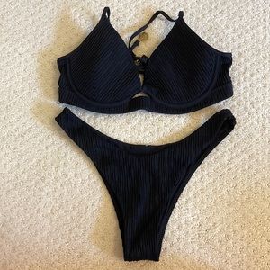 Luli Fama XS swimsuit